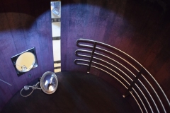 Inside the tank, the wood is stained purple.