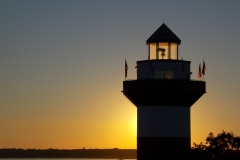 Sunset lights the lighthouse.