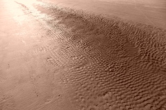 Sand shaped by the water.