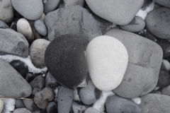 Black and white rocks on the southern beach of Iceland. They were this way when I found them.