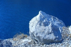 Baia di Ieranto. Big white rock above big blue water.